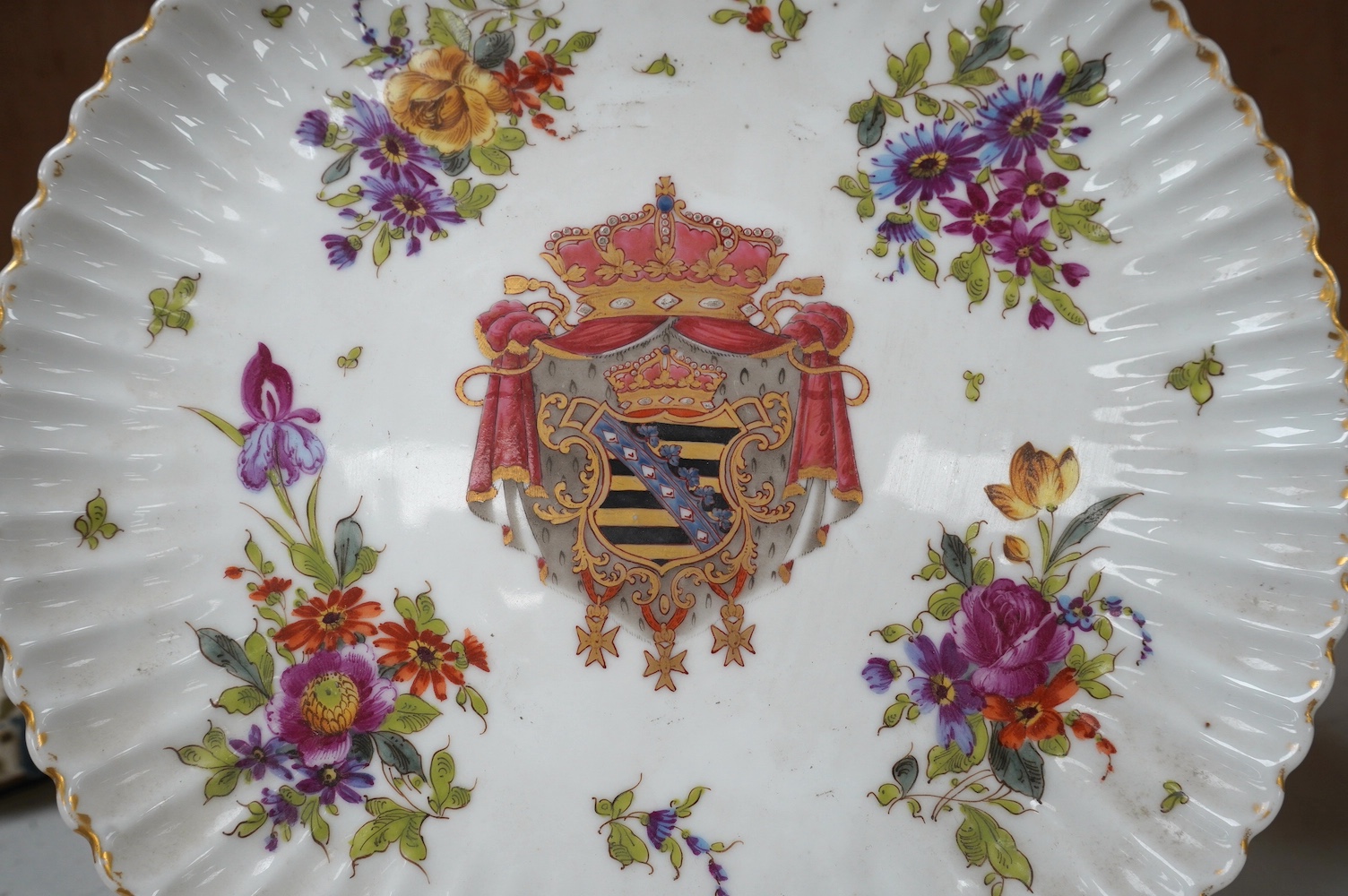 A Meissen style armorial porcelain plate, 25.5cm in diameter. Condition - good, minor wear